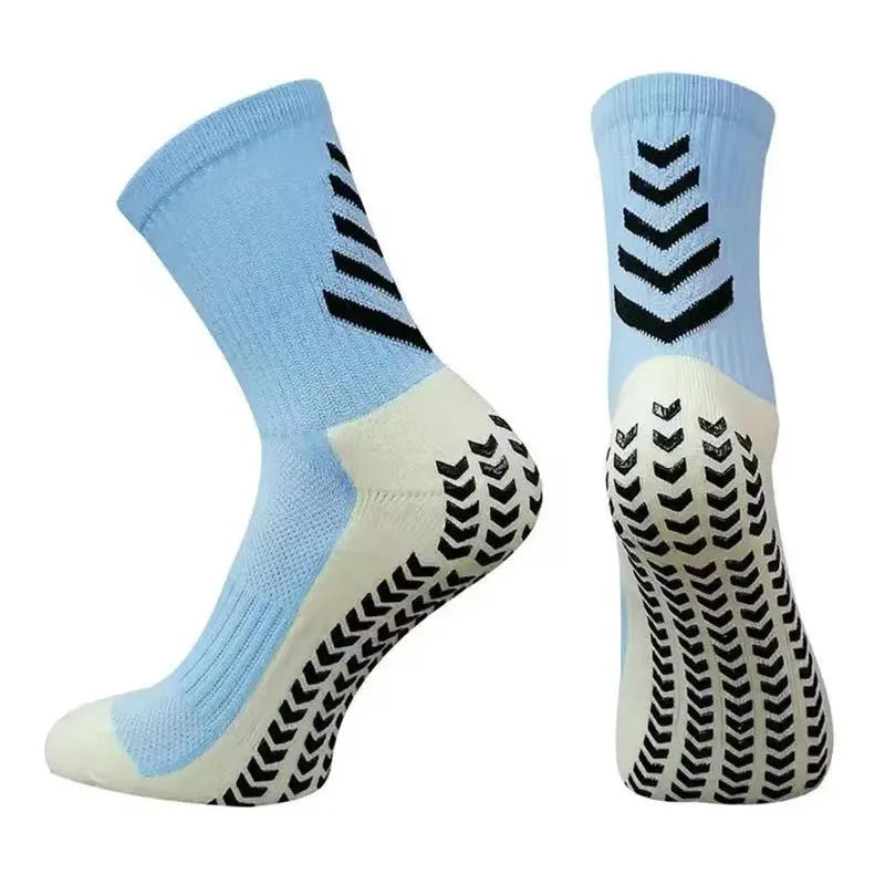 Men's black and green mid-calf athletic socks with a geometric pattern and non-slip silicone grip.