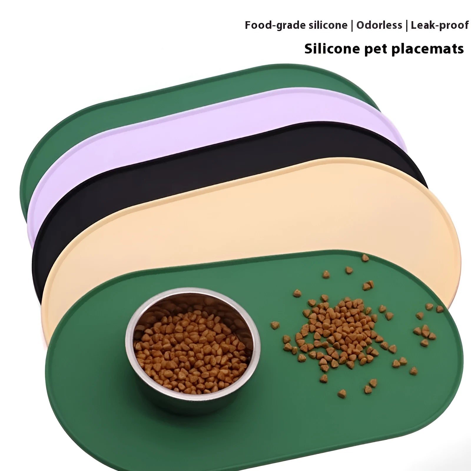 Green silicone cat feeding mat with raised edge under a ceramic bowl on a wooden floor