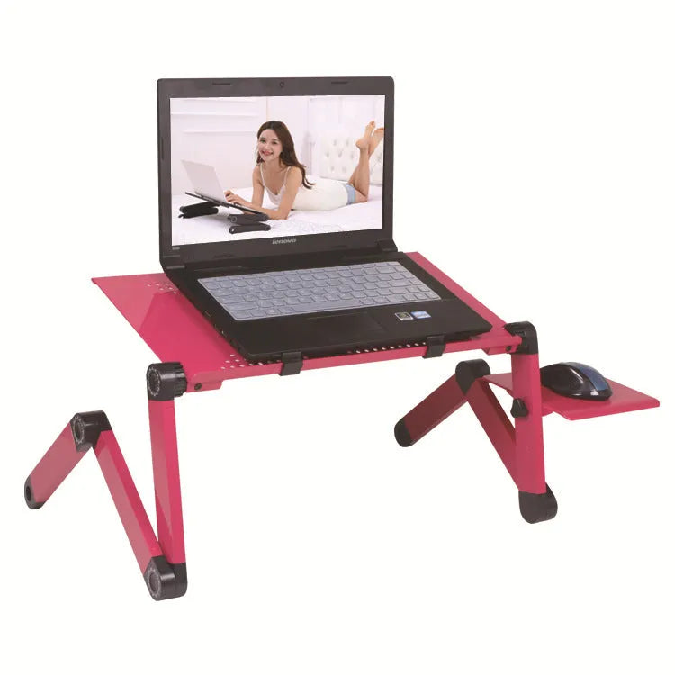 Folding metal laptop desk on bed with cooling fans and mouse board