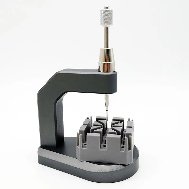 Silver-coloured tool steel press strap removal tool for watches and jewellery with metric blade.
