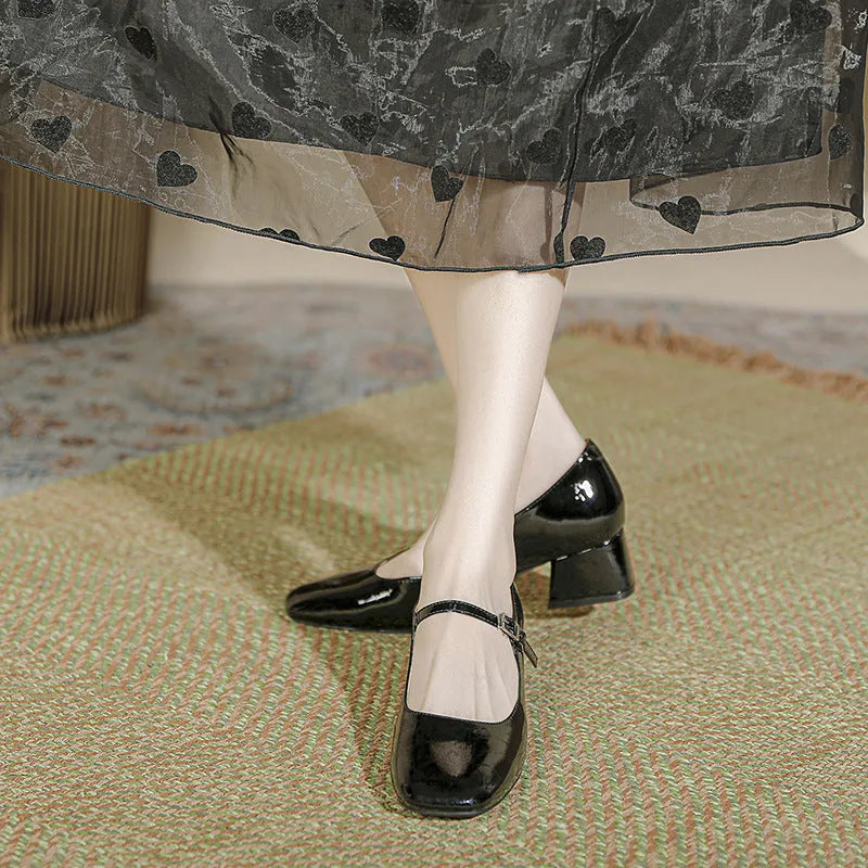 Women's square toe patent leather Mary Jane shoes with pearl detail and mid heel in apricot colour
