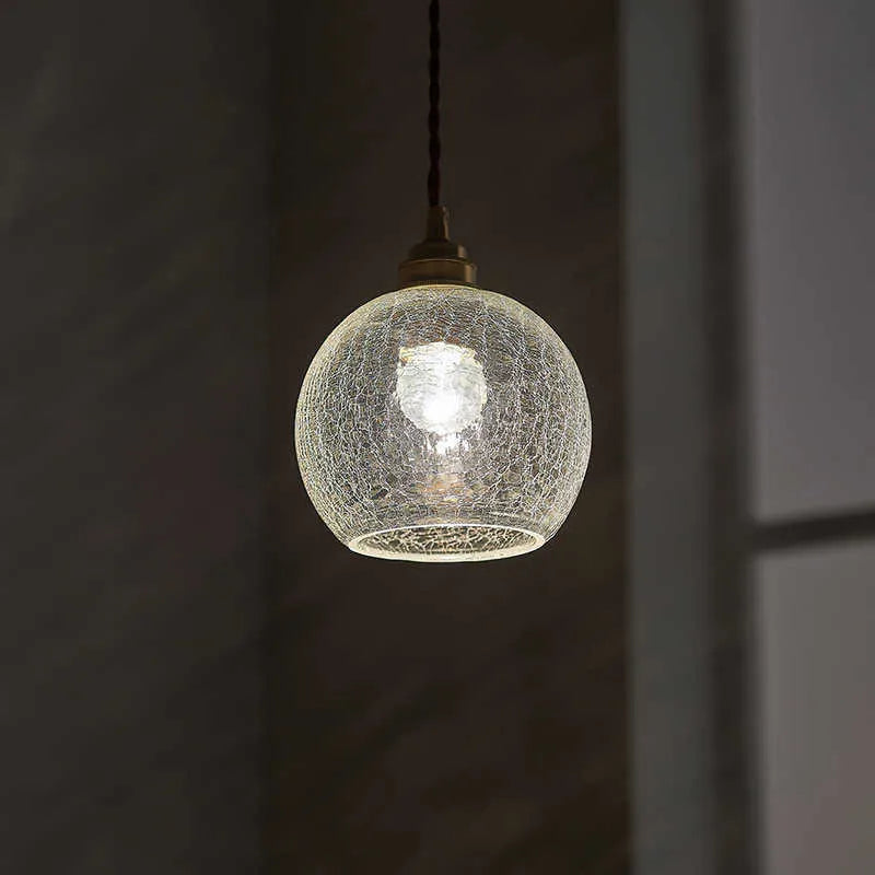 Brass and glass ball chandelier with spherical design measuring 17.5cm diameter