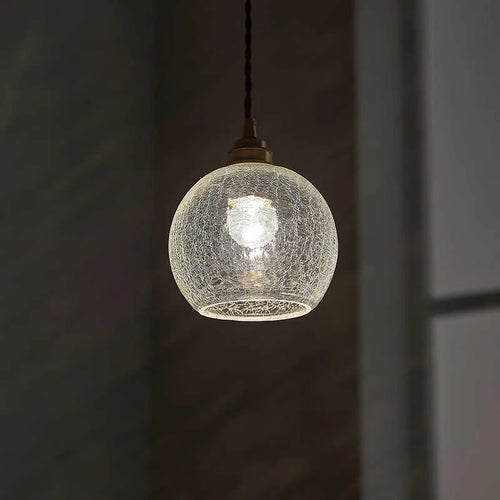 Brass and glass ball chandelier with spherical design measuring 17.5cm diameter