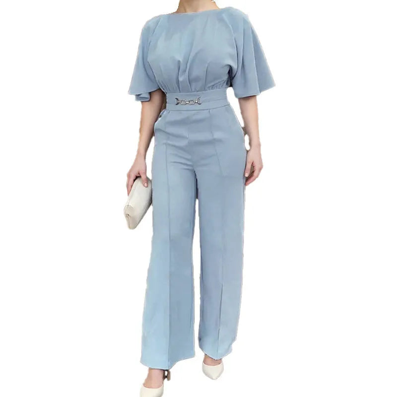 Blue men's casual suit with long sleeves and trousers on a hanger