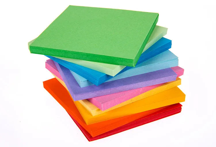 Colourful mini letter paper scrolls with eyelet holes for bottle messages in multiple sizes