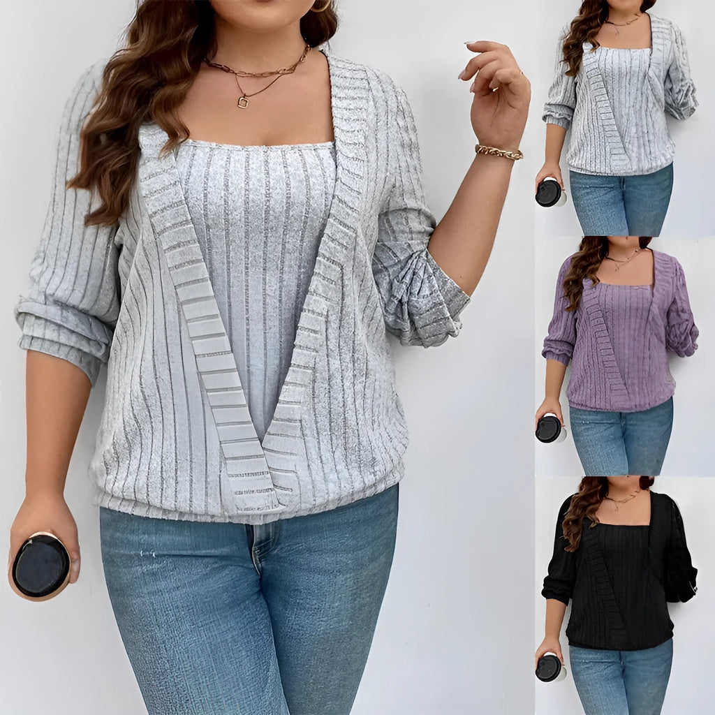 Women's solid colour rib-knit V-neck tunic with a false two-piece skirt design, shown in a loose fit.