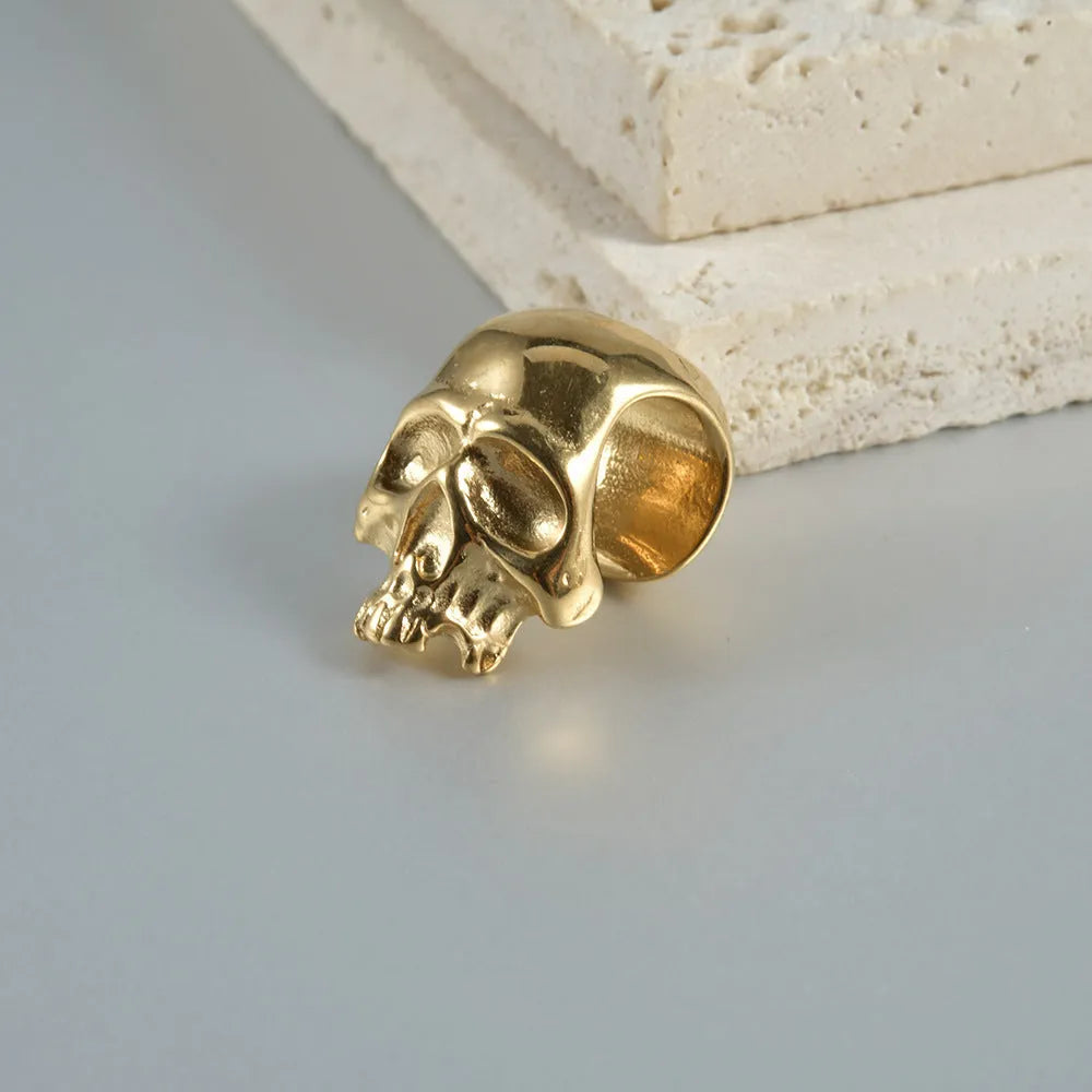 Personalised stainless steel hollow skull Buddha geometric earring in gold electroplate.