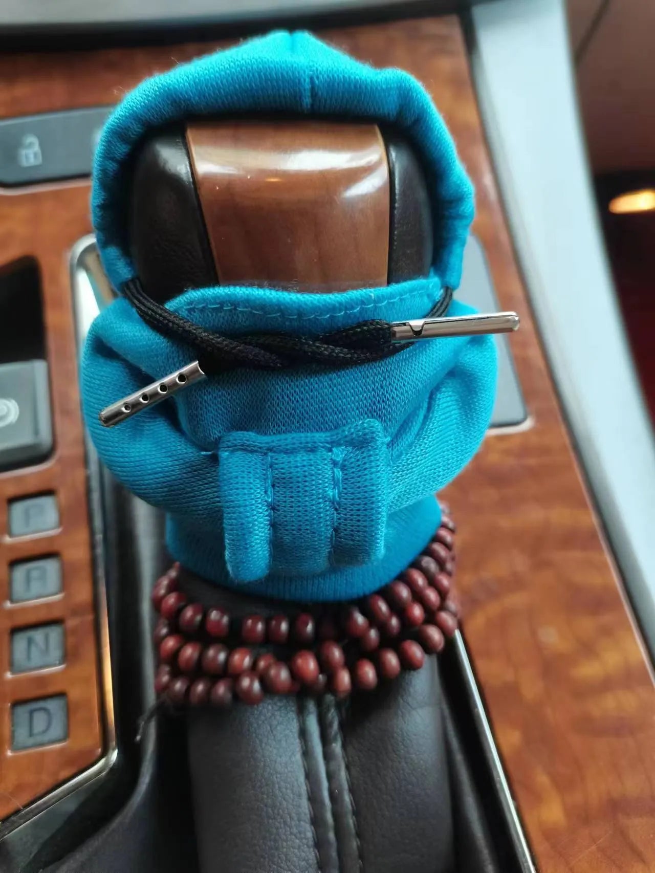 Dutch velvet car gear handle sleeve cover in multiple colours on a gear lever