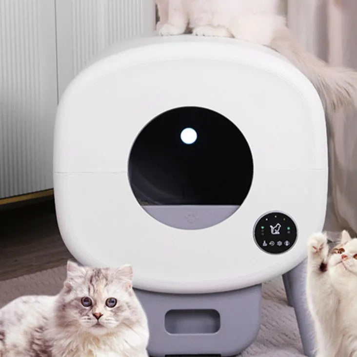 Automatic self-cleaning cat litter box made from white ABS plastic with a large interior.
