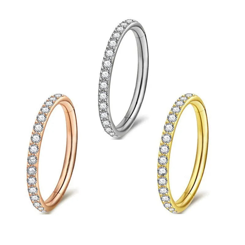 Stainless steel seamless nose ring showing colour options: black, gold, rose gold, and steel.