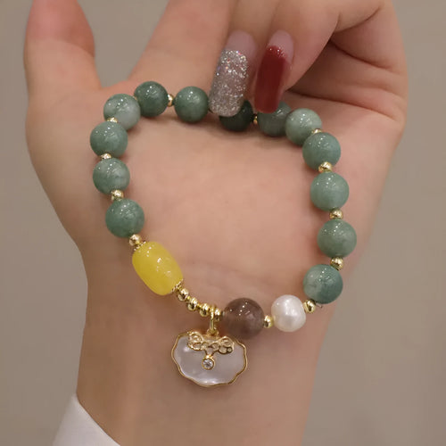 Women's green jade shell bracelet with adjustable fit in casual style