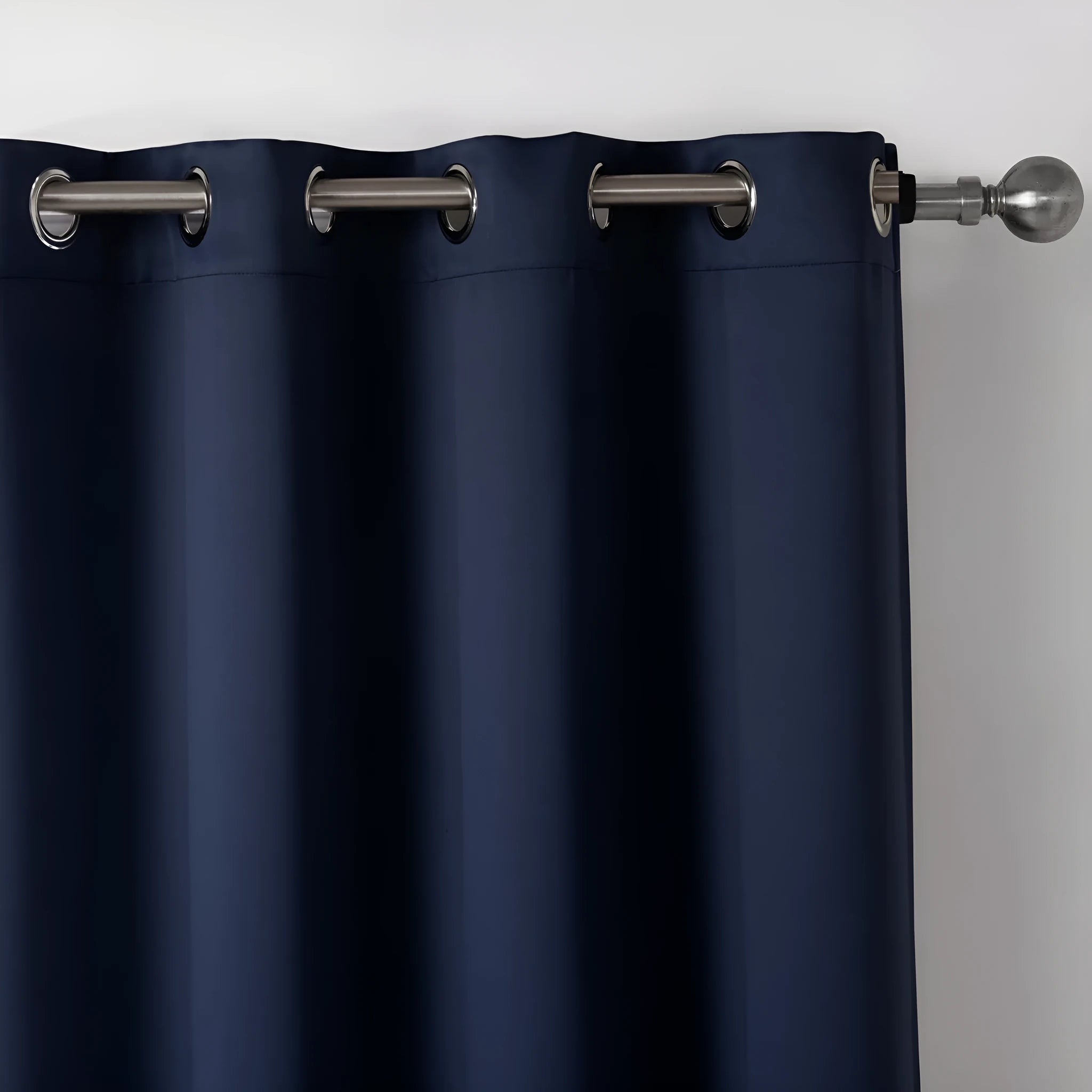 Dark navy blue modern blackout curtain made from shading cloth, hanging as a finished vertical panel.