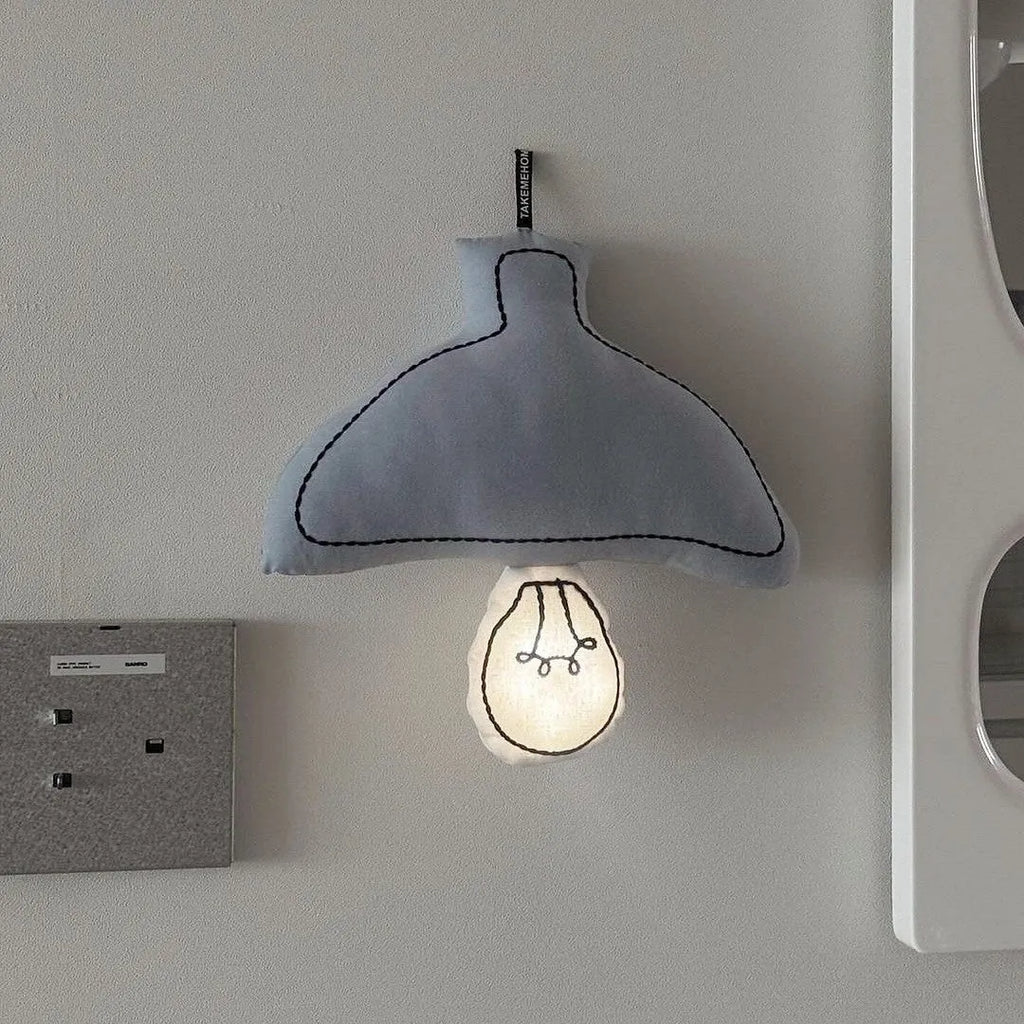 Beige fabric lampshade LED bedside lamp hanging on nursery wall for baby feeding