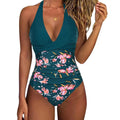 Women's printed one-piece bikini swimsuit with lace-up back detail in a leopard print pattern.