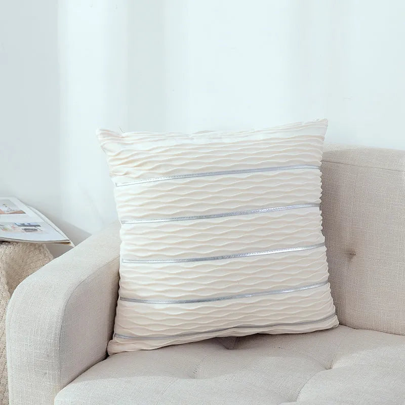 Square striped velvet pillow cover for sofa in multiple colour options on a grey background.