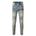 Light blue men's slim fit distressed jeans with hand-frayed detailing and a straight leg cut.