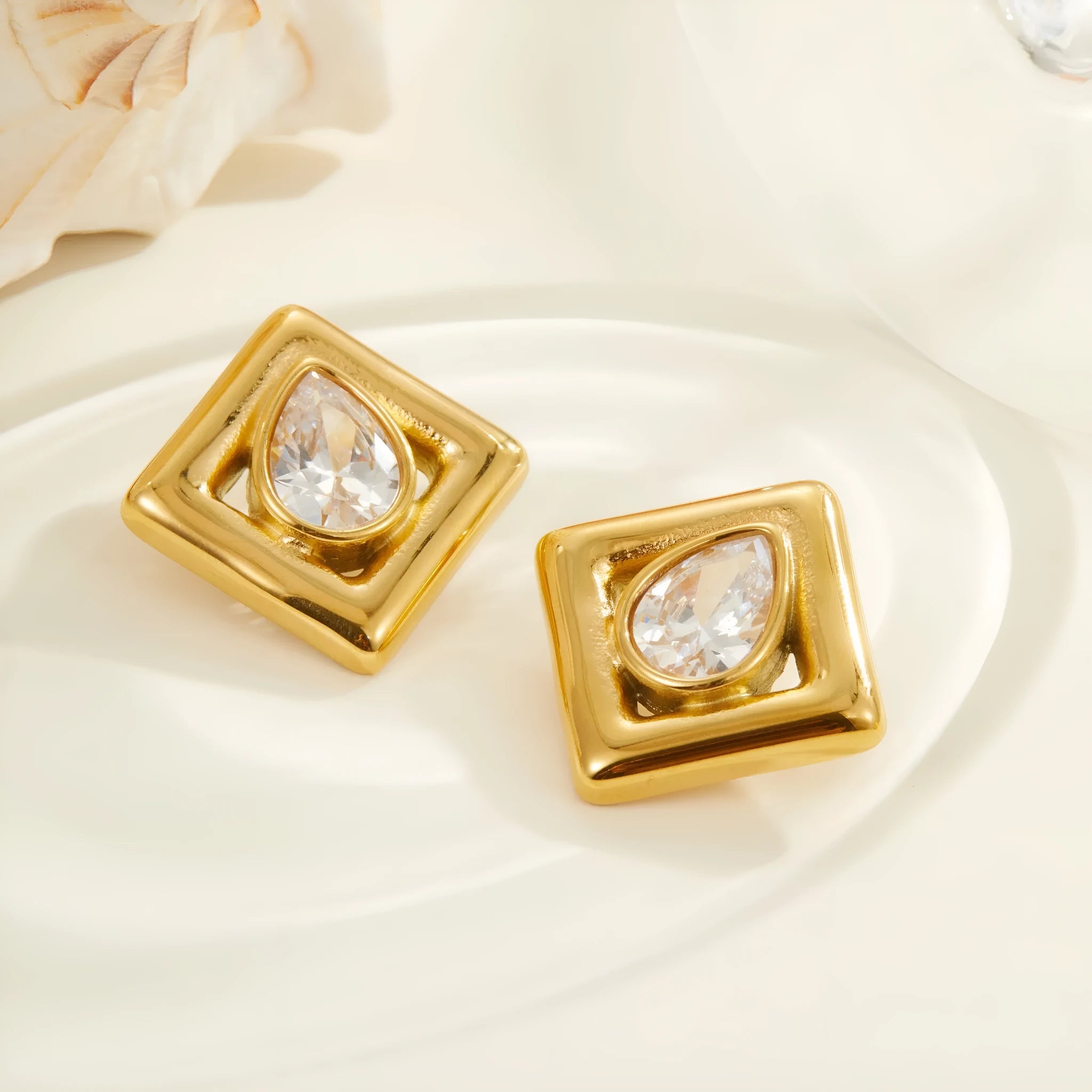 Geometric water drop zircon stud earrings in stainless steel with gold electroplating