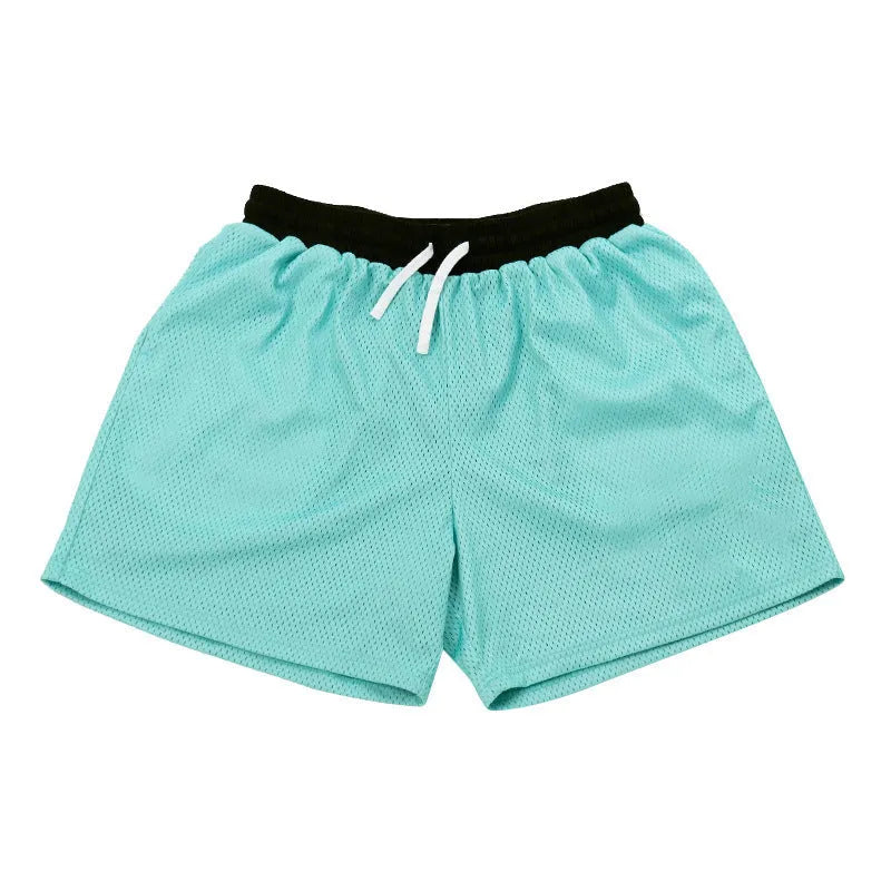 Men's solid colour quick-drying mesh sports shorts in black, shown for running.