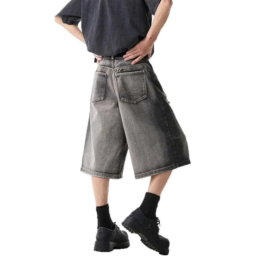 Gray water washed hole detail denim shorts with cropped length and loose fit