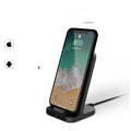 Dark grey vertical wireless charging stand for Apple phones measuring 70x70x113 mm