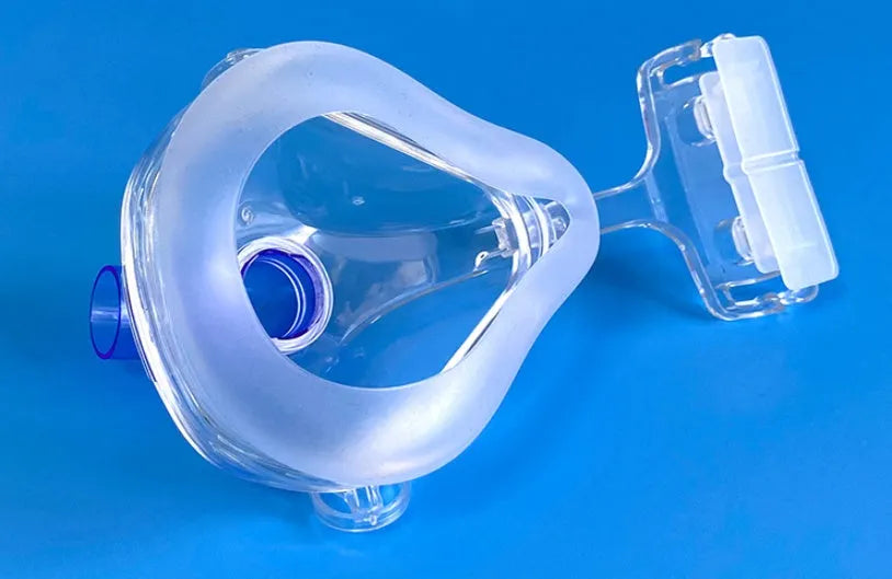 Transparent CPAP breathing mask with silicone cushion, PC frame, headgear, and adapter elbows