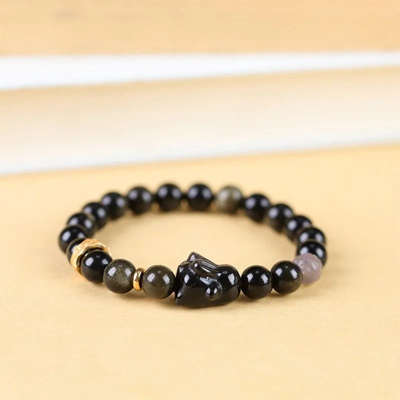 Handmade national style bracelet with a lying rabbit Jin Yaoshi charm and gray agate beads.