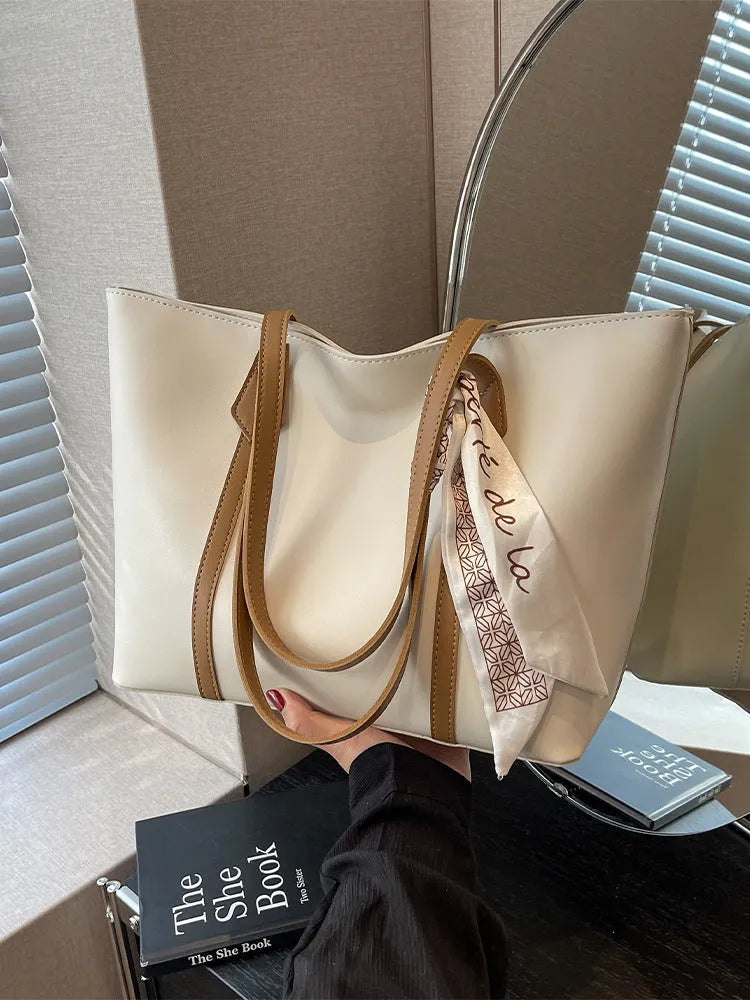 Women's large capacity casual tote bag in bucket design showing six colour options