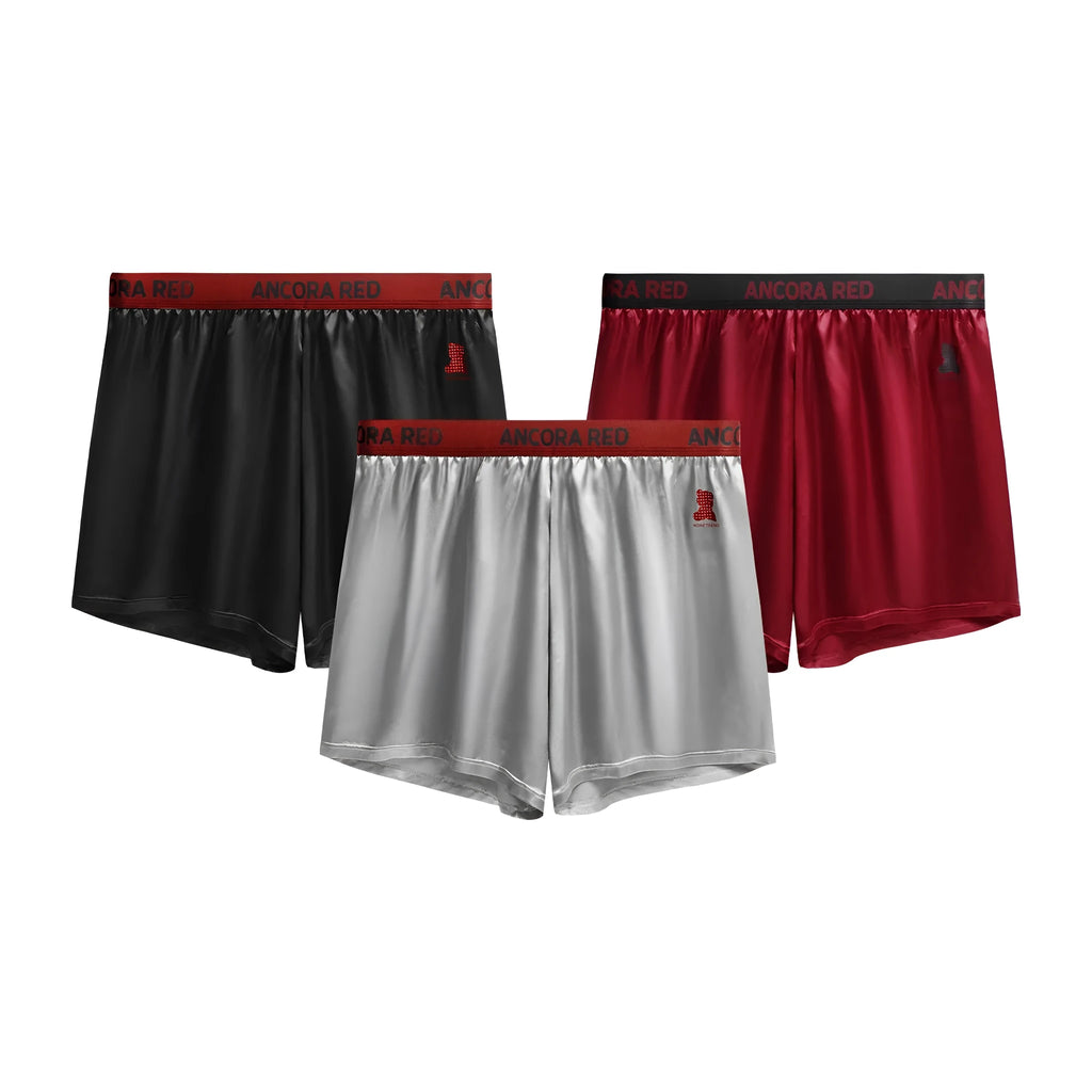 Men's solid colour boxer briefs in black, shown with mid-waist design.