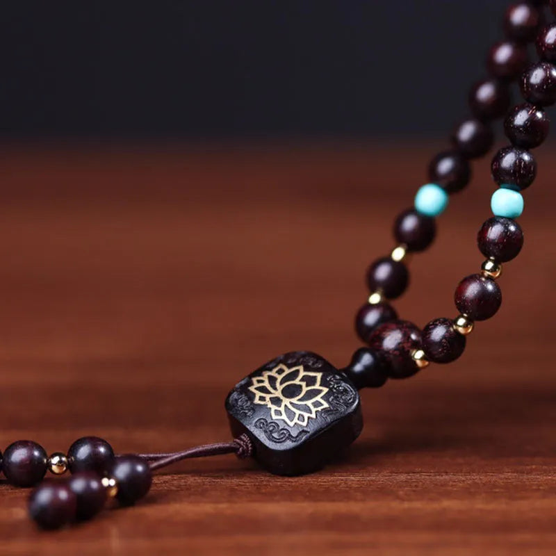 Zambian rosewood Buddha beads bracelet with 108 wooden beads and flat lotus pendant on string