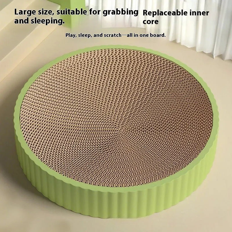 Round green and white cat scratching board with corrugated paper surface and replacement pads