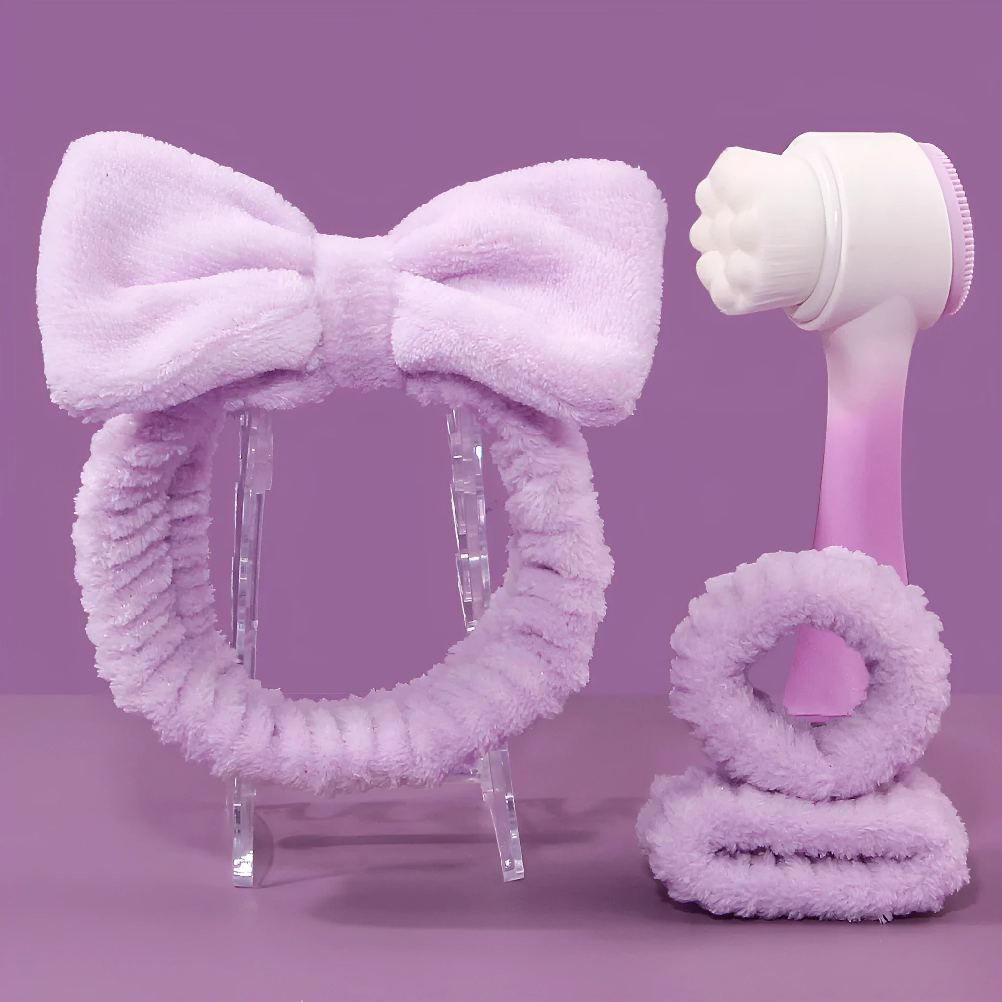 Facial brush set with coral fleece hair band in multiple colours including purple, grey, white, and pink