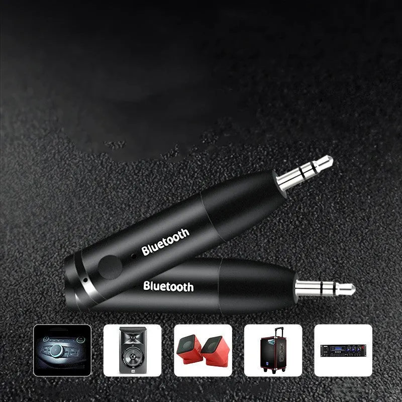 Black Bluetooth 5.0 audio receiver for car AUX or home stereo, shown with USB cable.