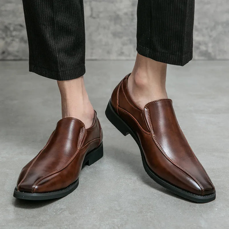 Men's black patent leather pointed toe shoes with a flat rubber sole and leather lining.