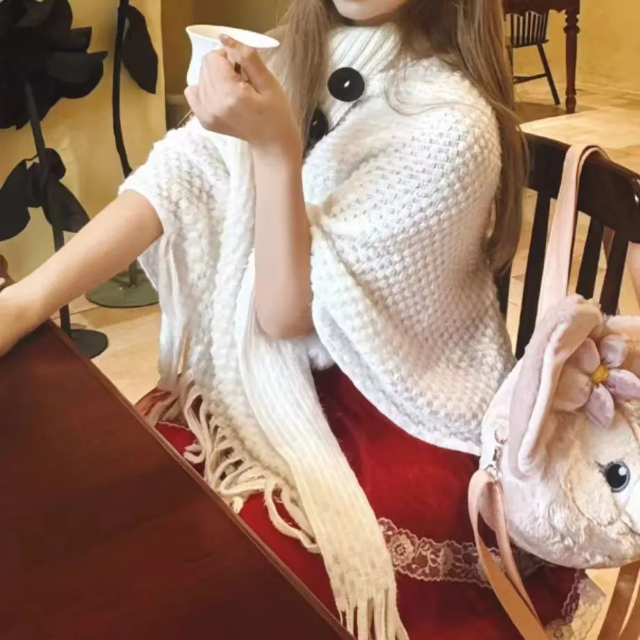 Women's plush triangle shawl cape with tassel fringe in seven colour options