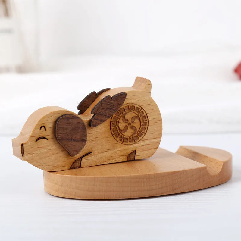 Handcrafted beech wood and resin lazy bracket mobile phone holder on a wooden desk