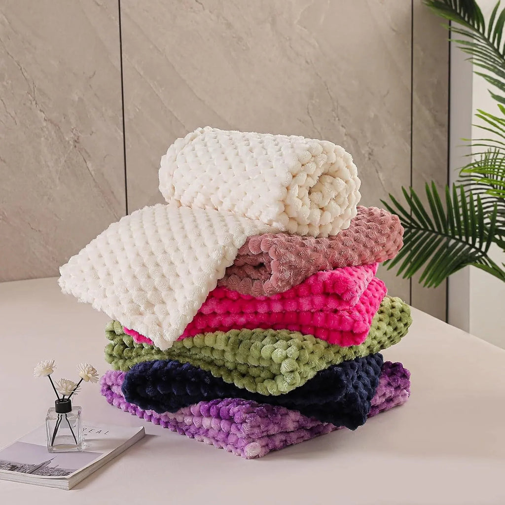 Children's soft plaid polyester blanket shown in camel colour, suitable for nap time.
