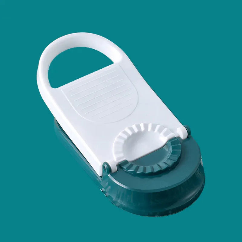 Orange and white manual dumpling skin press tool with ergonomic handle and hanging hole