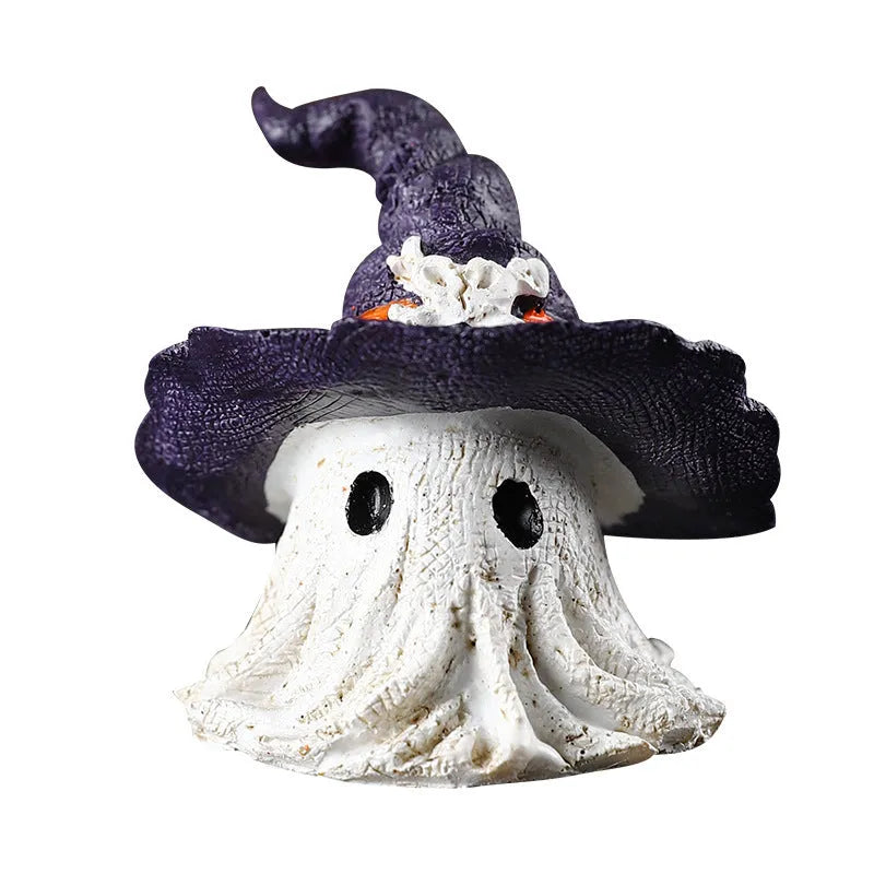 Black and purple resin wizard hat holiday ornament on a festive background.