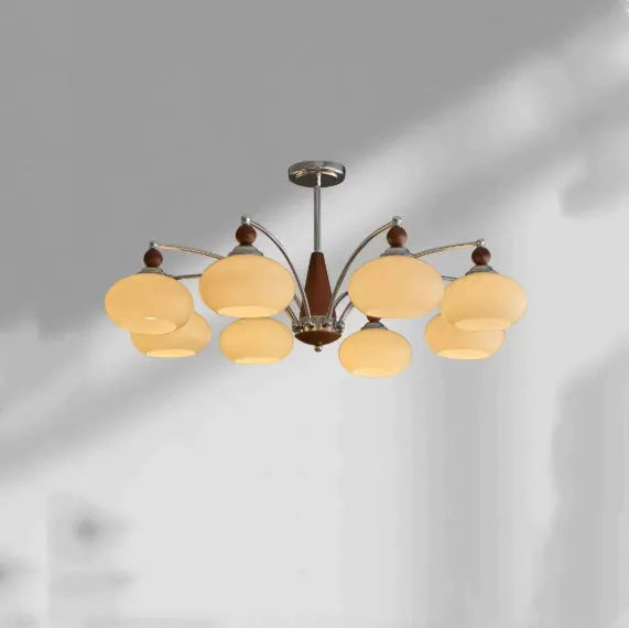 Persimmon glass and chrome chandelier with multiple glass lampshades in a choice of colours.
