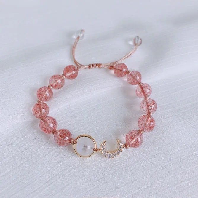Handmade women's bracelet with Hetian jade and strawberry quartz crystals in peach blossom design