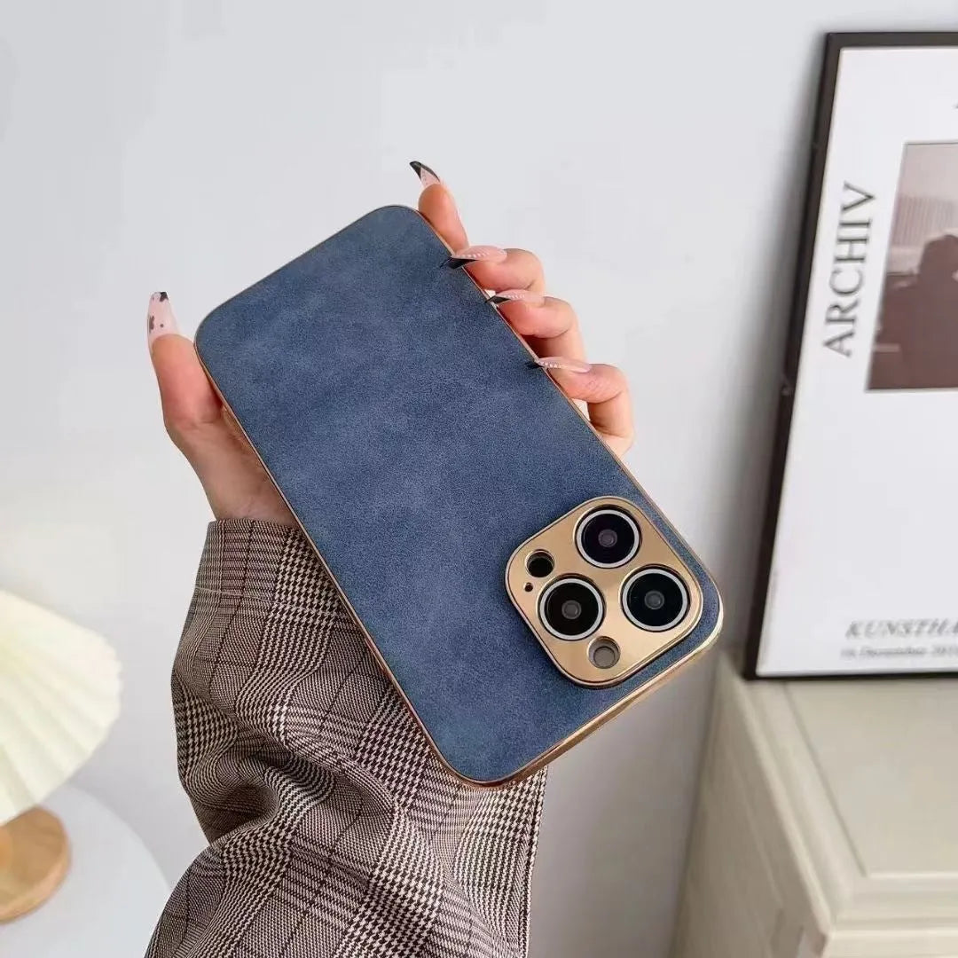 Slim black leather texture phone case fitted on an iPhone 14, showing textured finish and precise camera cutouts.