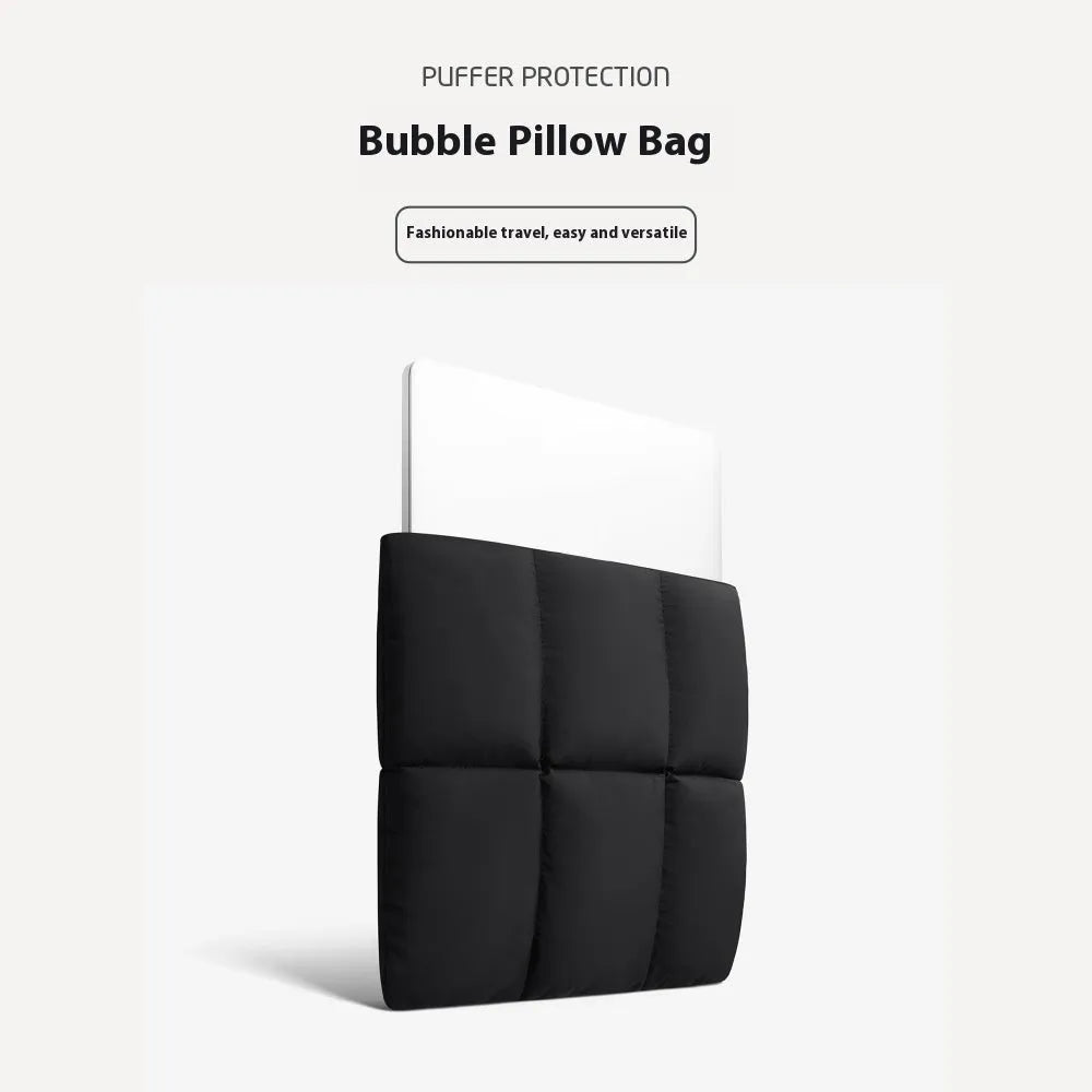 Soft black retro-style laptop sleeve for 13 to 15.6 inch laptops on a table.