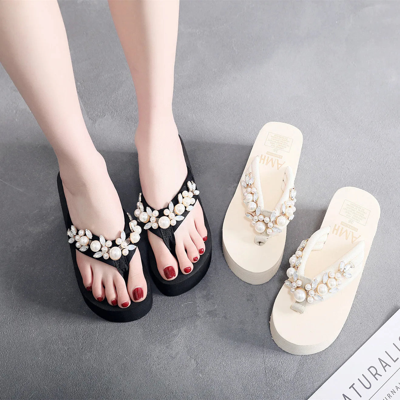 Women's beige high-heeled flip-flops with cotton cloth upper, shown from the side.