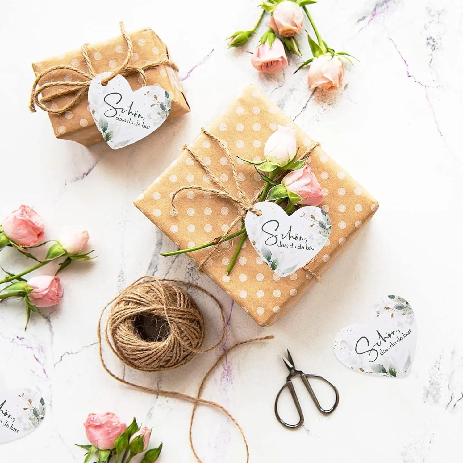 Fifty flower heart-shaped paper gift tags in two style colour options, half-handmade construction