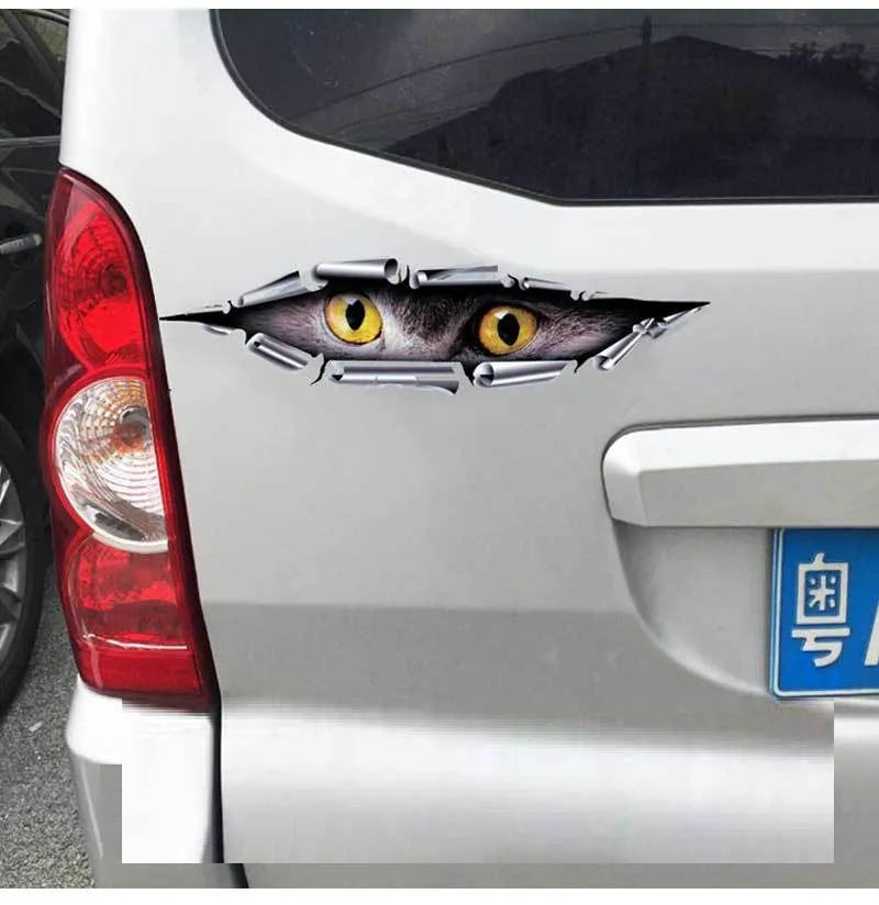 3D Tiger Eye or Eagle Eye pattern car door sticker on a vehicle bumper.