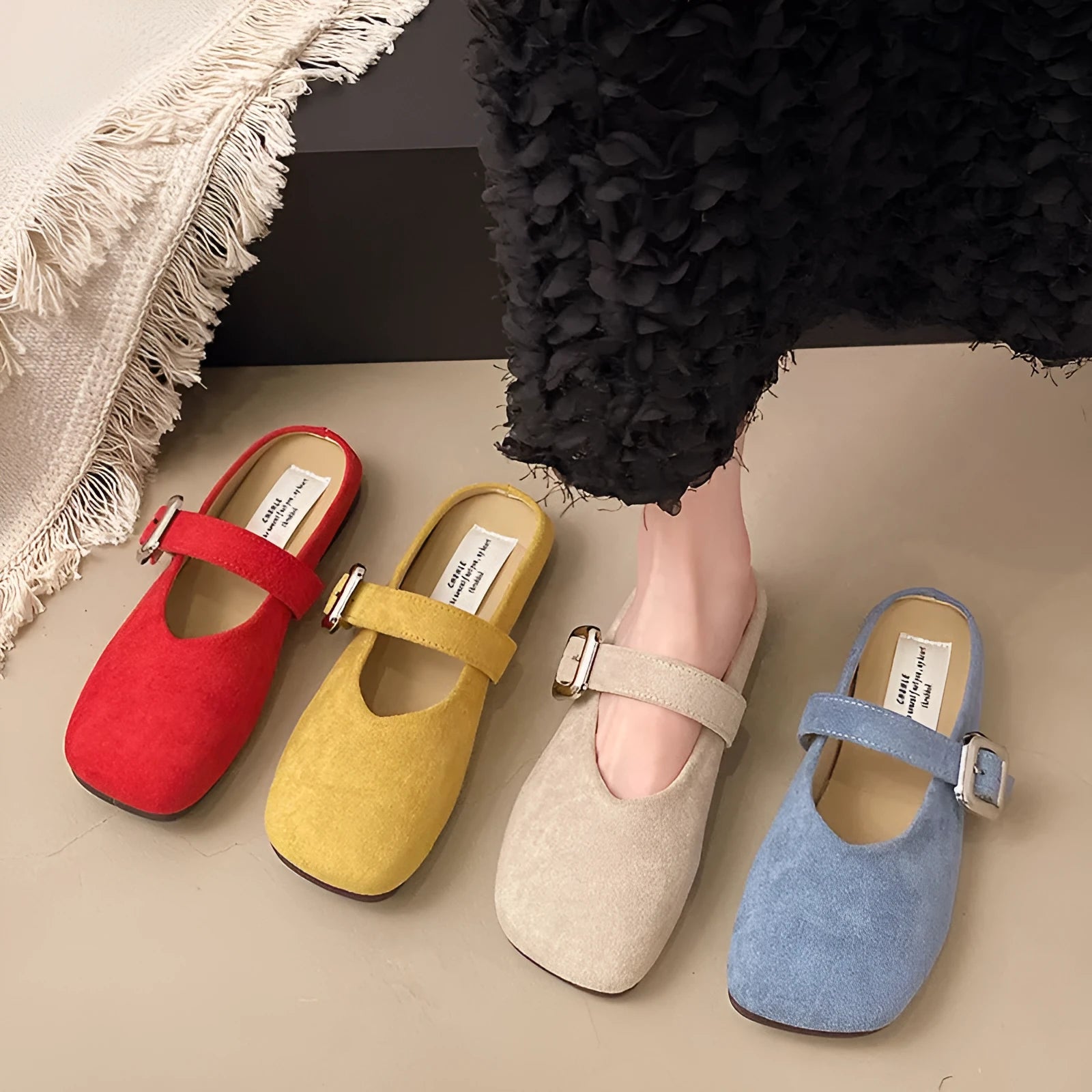 Women's flat closed-toe slippers with square toe in blue, showing PU upper and rubber sole.