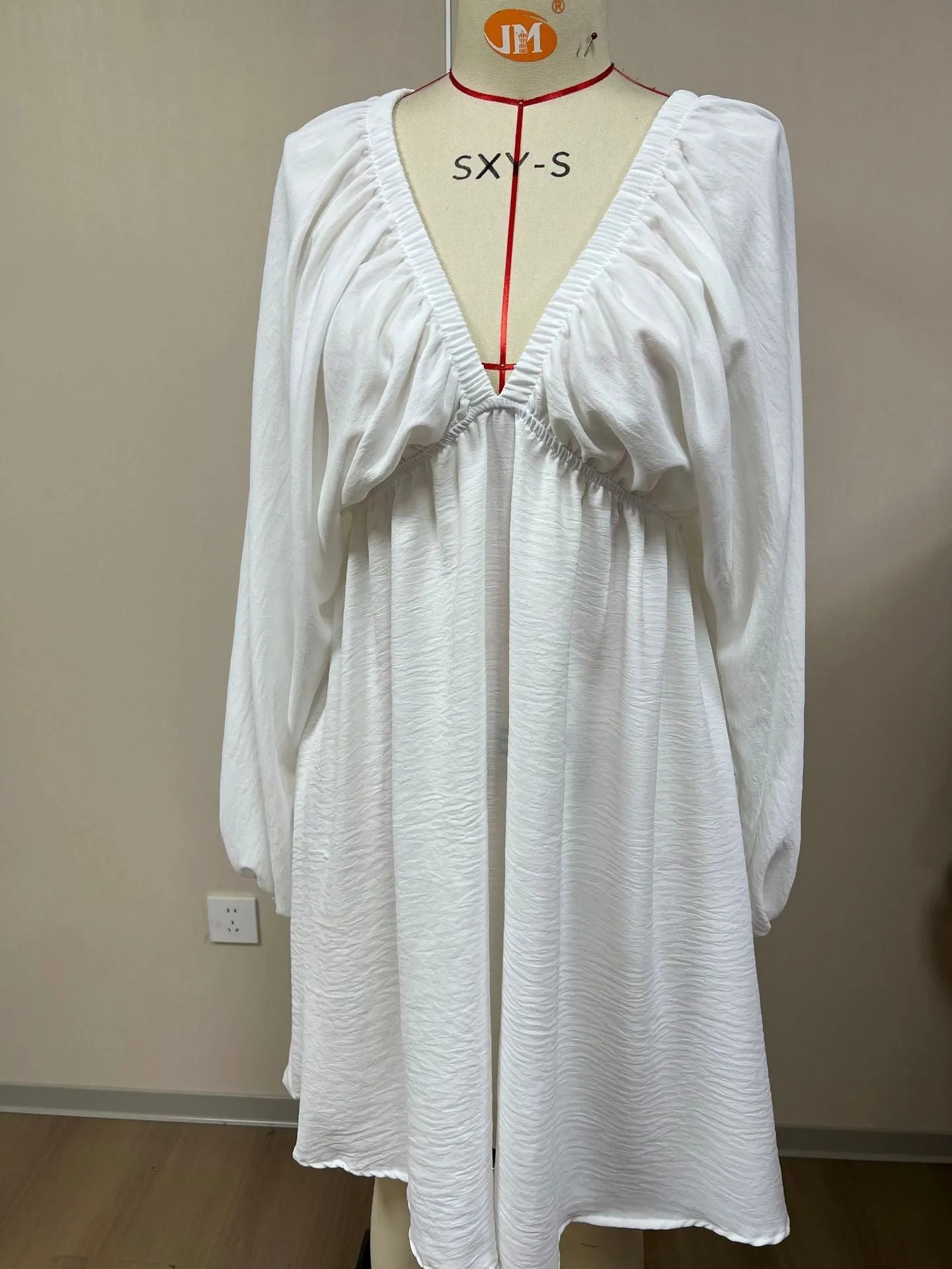 Women's V-neck long sleeve dress with puff sleeves and flounced swing skirt in solid colour