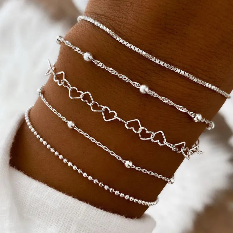 Multi-layer chain minimalist bracelet in zinc alloy with electroplated geometric finish, unisex style