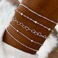 Multi-layer chain minimalist bracelet in zinc alloy with electroplated geometric finish, unisex style