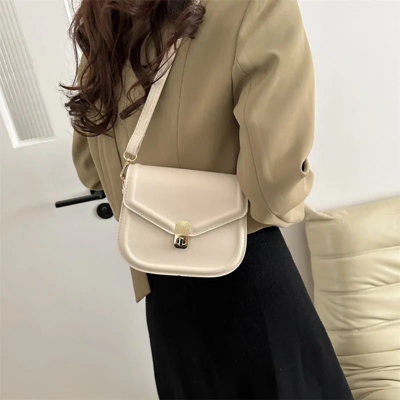 Soft PU leather messenger bag with clamshell opening in horizontal square shape
